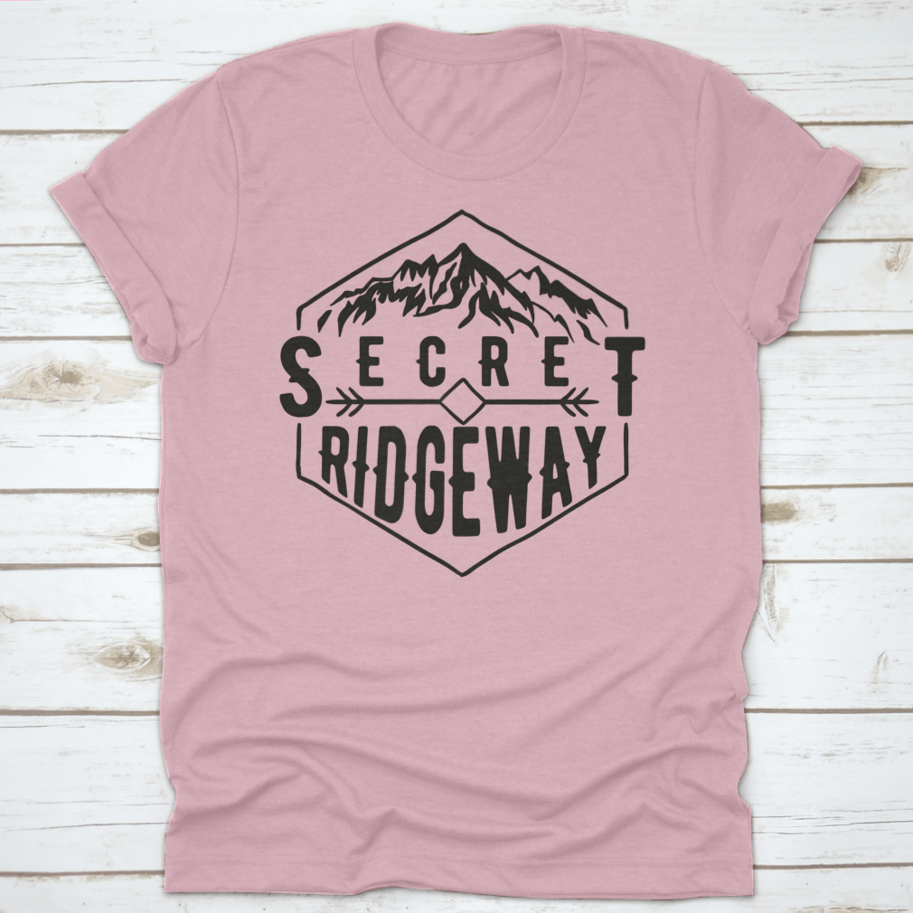 A stylish Wanderlust graphic tee featuring a mountain print, made from soft cotton fabric, perfect for outdoor enthusiasts.