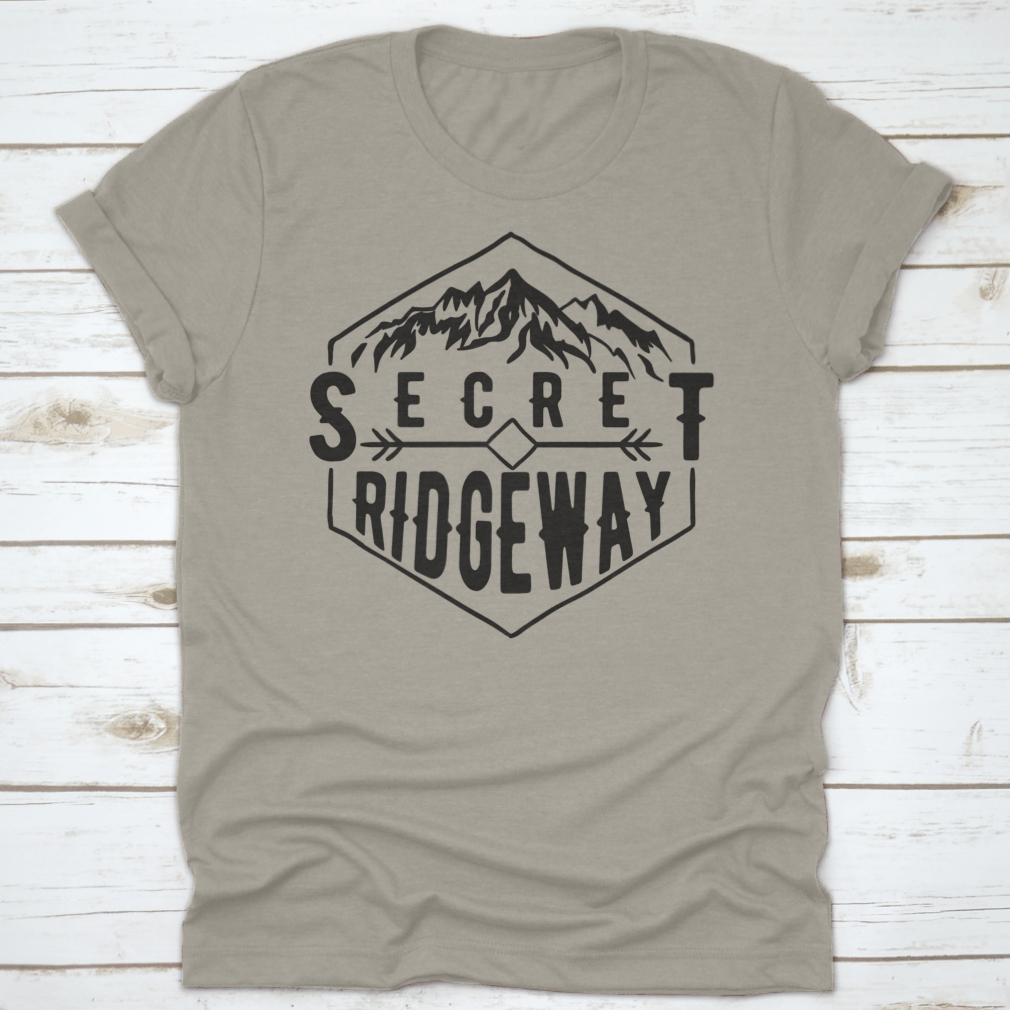 A stylish Wanderlust graphic tee featuring a mountain print, made from soft cotton fabric, perfect for outdoor enthusiasts.