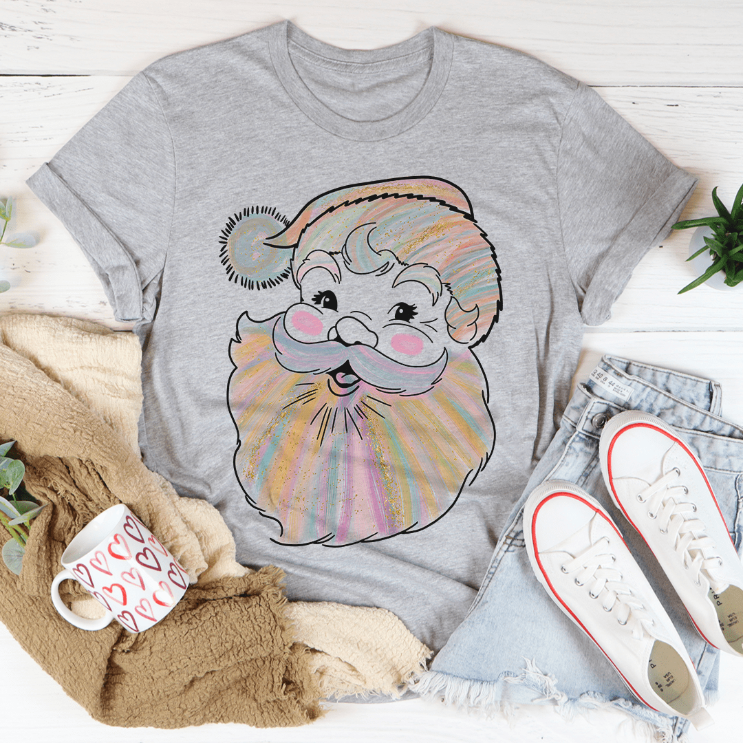 A festive Watercolor Santa Tee featuring a colorful Santa design, made from 100% soft cotton, perfect for holiday celebrations.