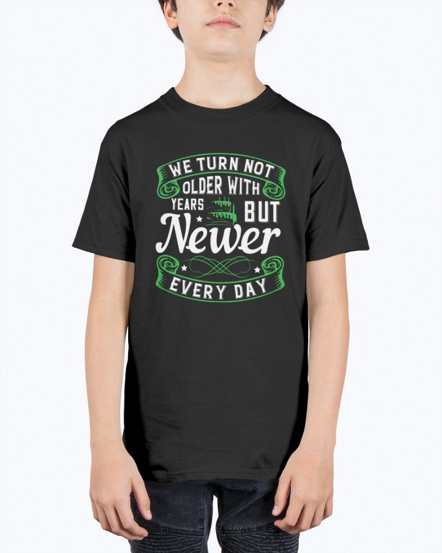 A stylish unisex birthday t-shirt featuring the quote 'We turn not older with years, but newer every day' in a vibrant design.