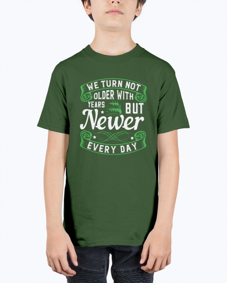 A stylish unisex birthday t-shirt featuring the quote 'We turn not older with years, but newer every day' in a vibrant design.