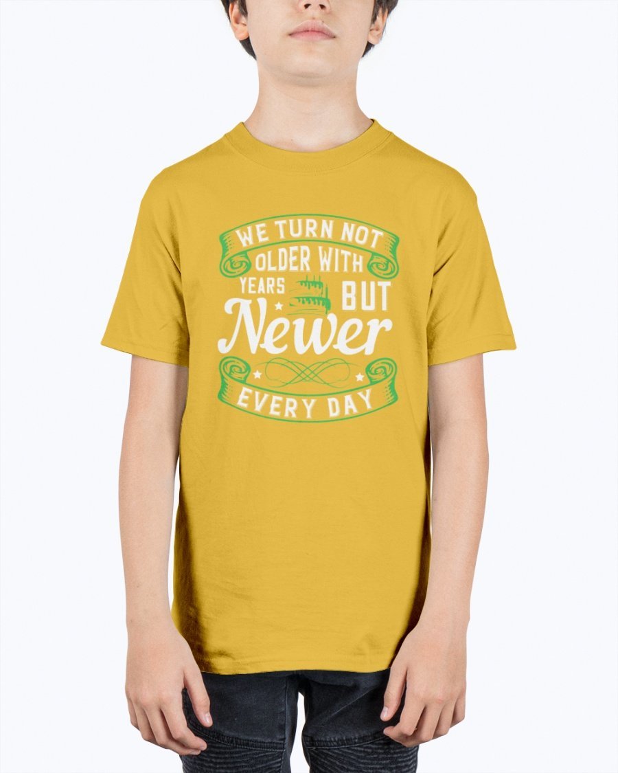 A stylish unisex birthday t-shirt featuring the quote 'We turn not older with years, but newer every day' in a vibrant design.