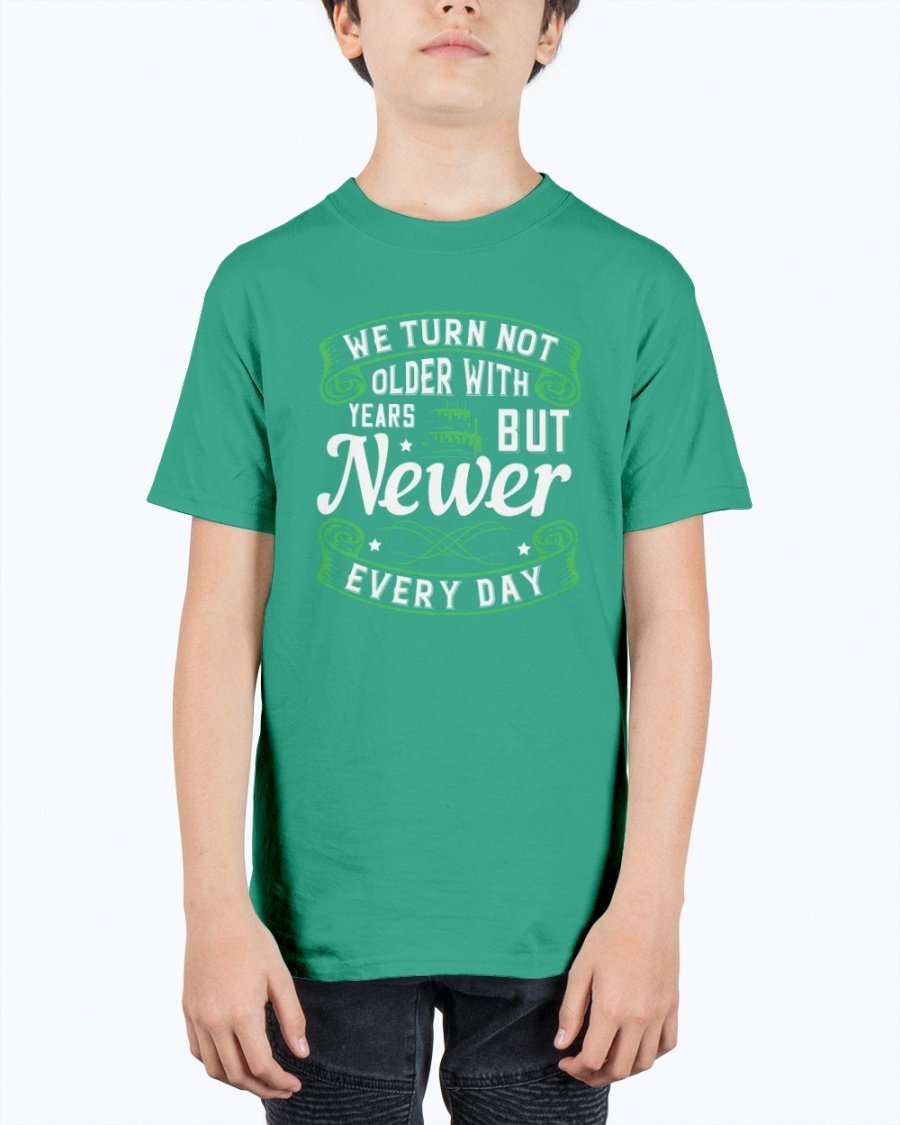 A stylish unisex birthday t-shirt featuring the quote 'We turn not older with years, but newer every day' in a vibrant design.