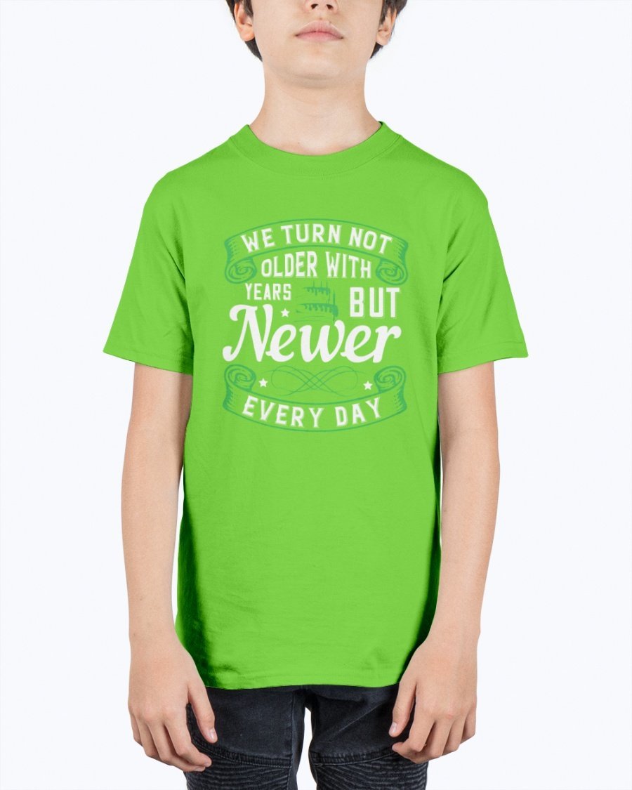 A stylish unisex birthday t-shirt featuring the quote 'We turn not older with years, but newer every day' in a vibrant design.