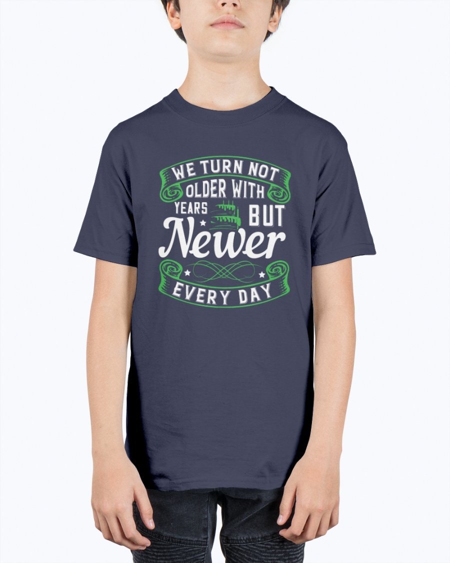 A stylish unisex birthday t-shirt featuring the quote 'We turn not older with years, but newer every day' in a vibrant design.