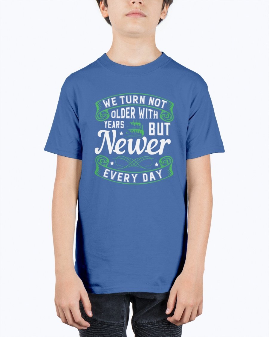 A stylish unisex birthday t-shirt featuring the quote 'We turn not older with years, but newer every day' in a vibrant design.