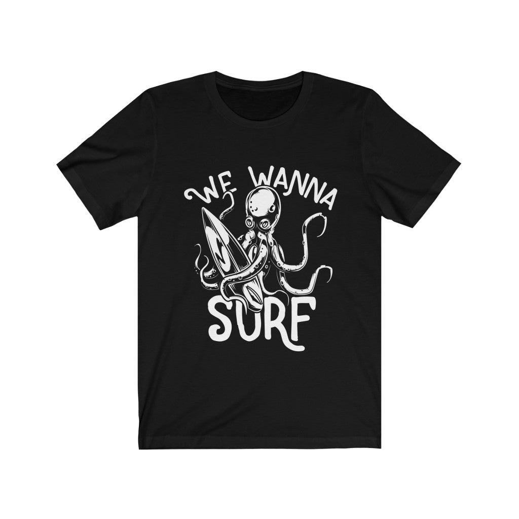 We Wanna Surf Graphic T-Shirt featuring vibrant surf-themed design on soft cotton fabric.