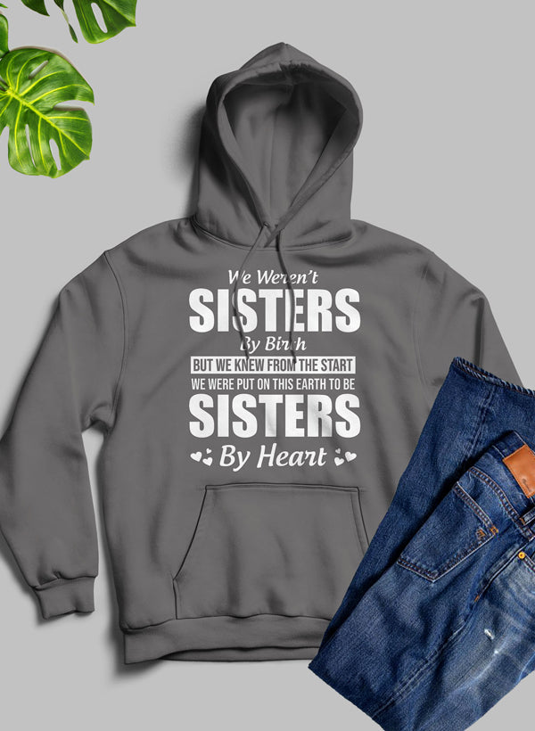 We Weren't Sisters By Birth Hoodie featuring a cozy fleece blend, adjustable hood, and unique artistic design.