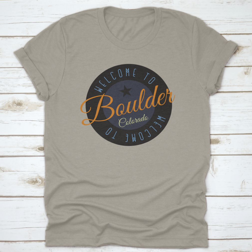 A stylish cotton shirt featuring the phrase 'Welcome To Boulder Colorado' with scenic designs, perfect for tourists and locals.
