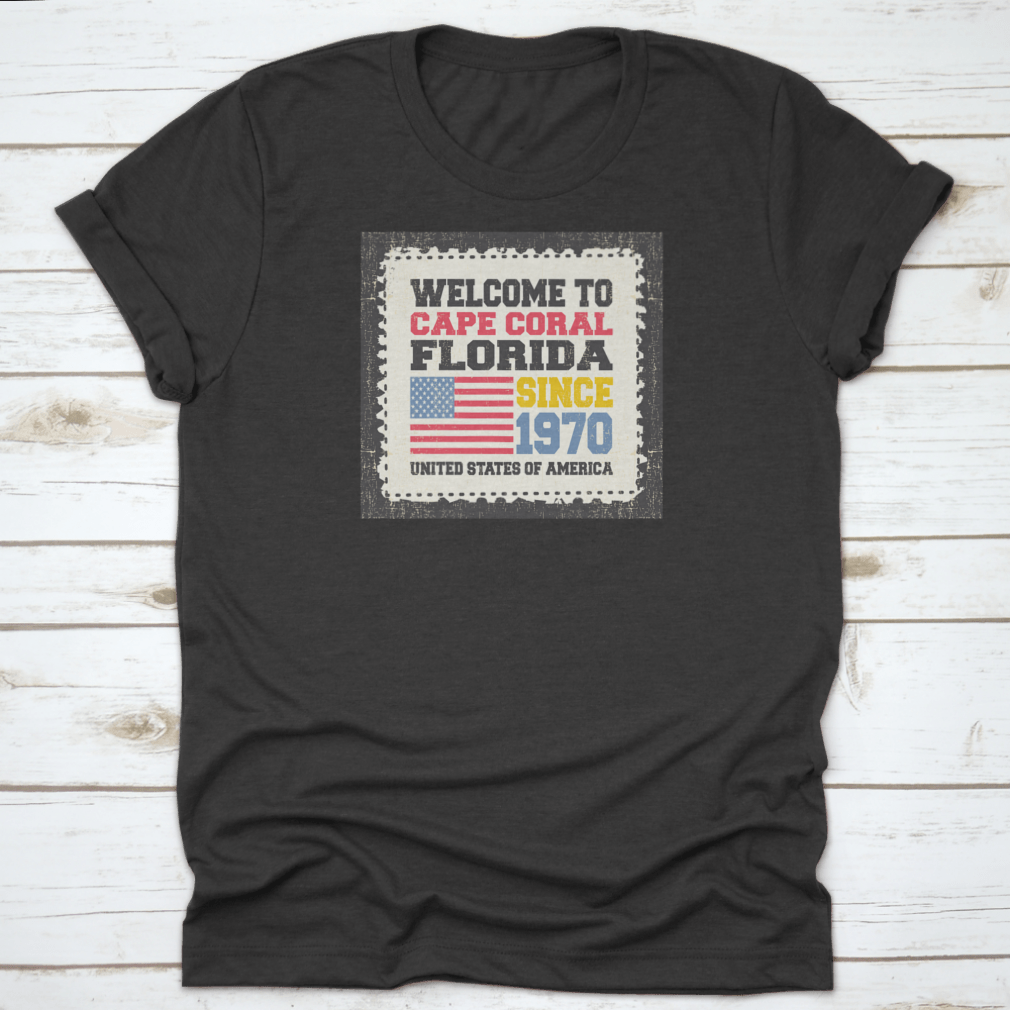 A comfortable cotton t-shirt featuring the American flag and the text 'Welcome To Cape Coral, State Florida. Since 1970' in a classic fit.