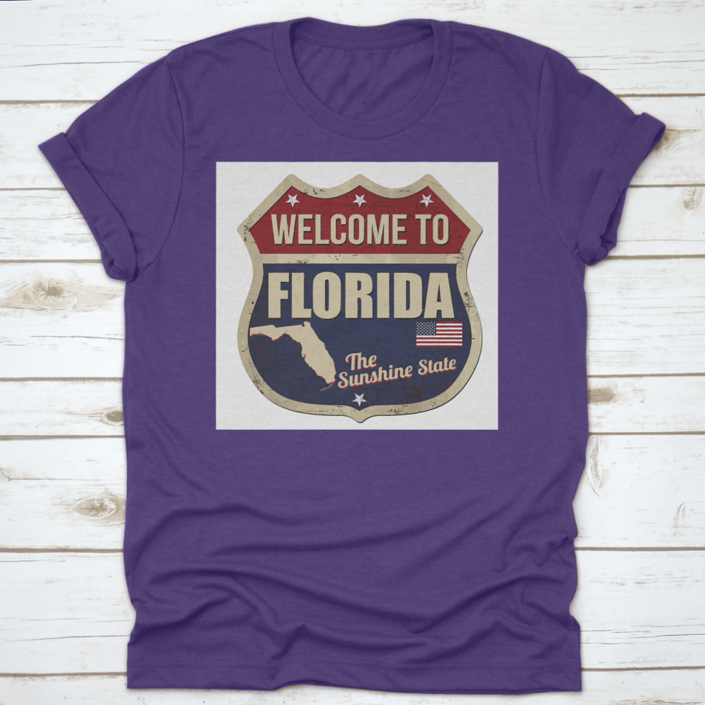 Vintage rusty metal sign featuring 'Welcome To Florida' on a white background, perfect for home decor.