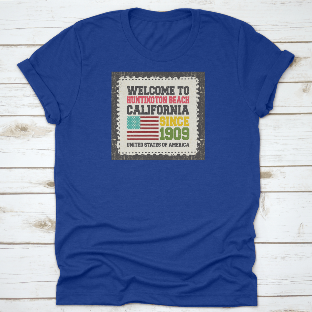 A classic cotton t-shirt featuring the American flag design, representing Huntington Beach, California.