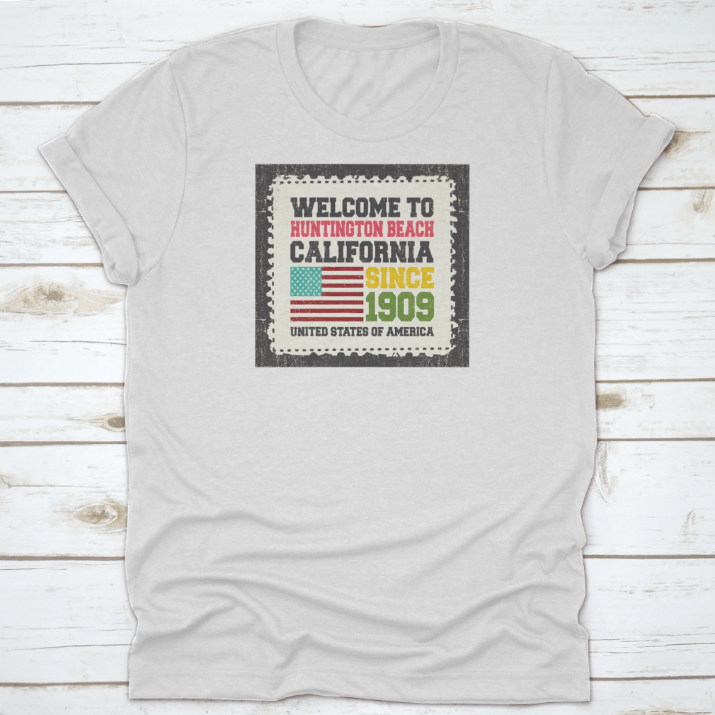 A classic cotton t-shirt featuring the American flag design, representing Huntington Beach, California.