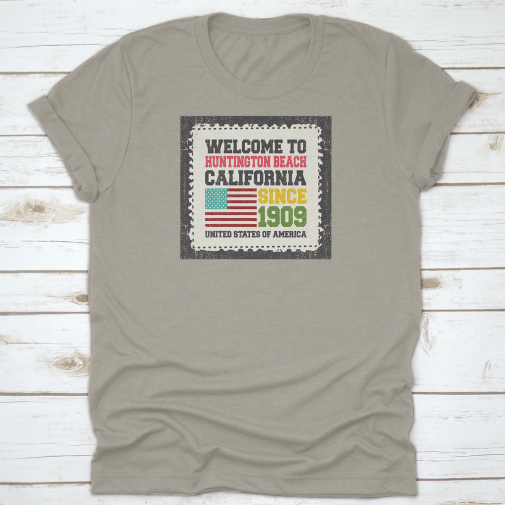 A classic cotton t-shirt featuring the American flag design, representing Huntington Beach, California.