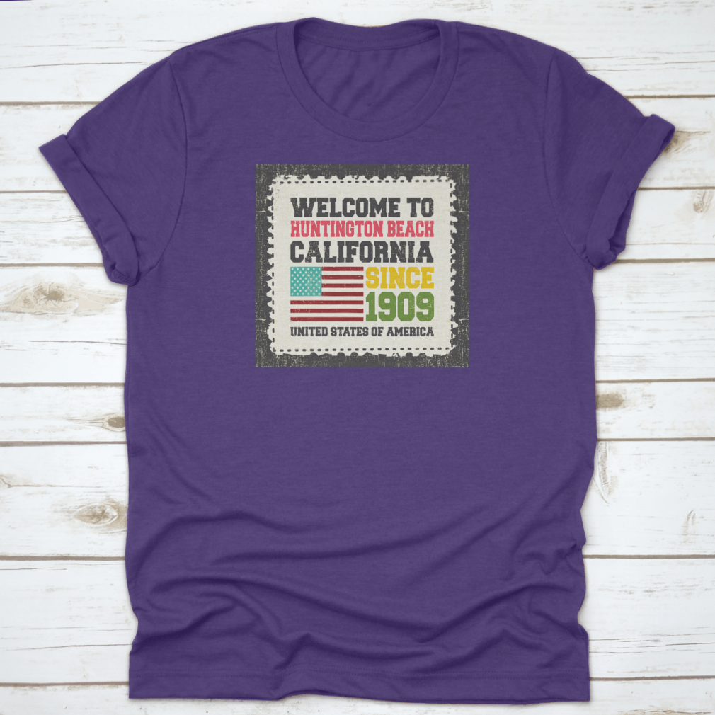 A classic cotton t-shirt featuring the American flag design, representing Huntington Beach, California.