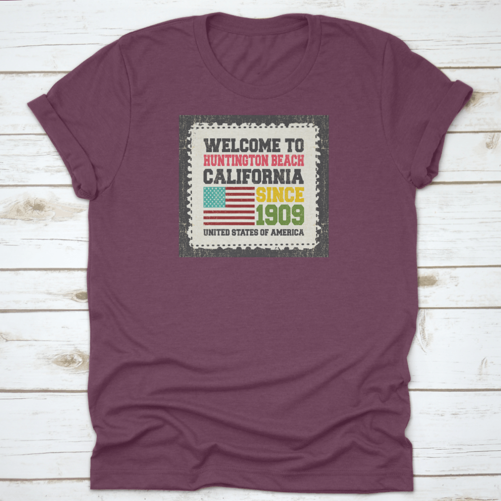 A classic cotton t-shirt featuring the American flag design, representing Huntington Beach, California.