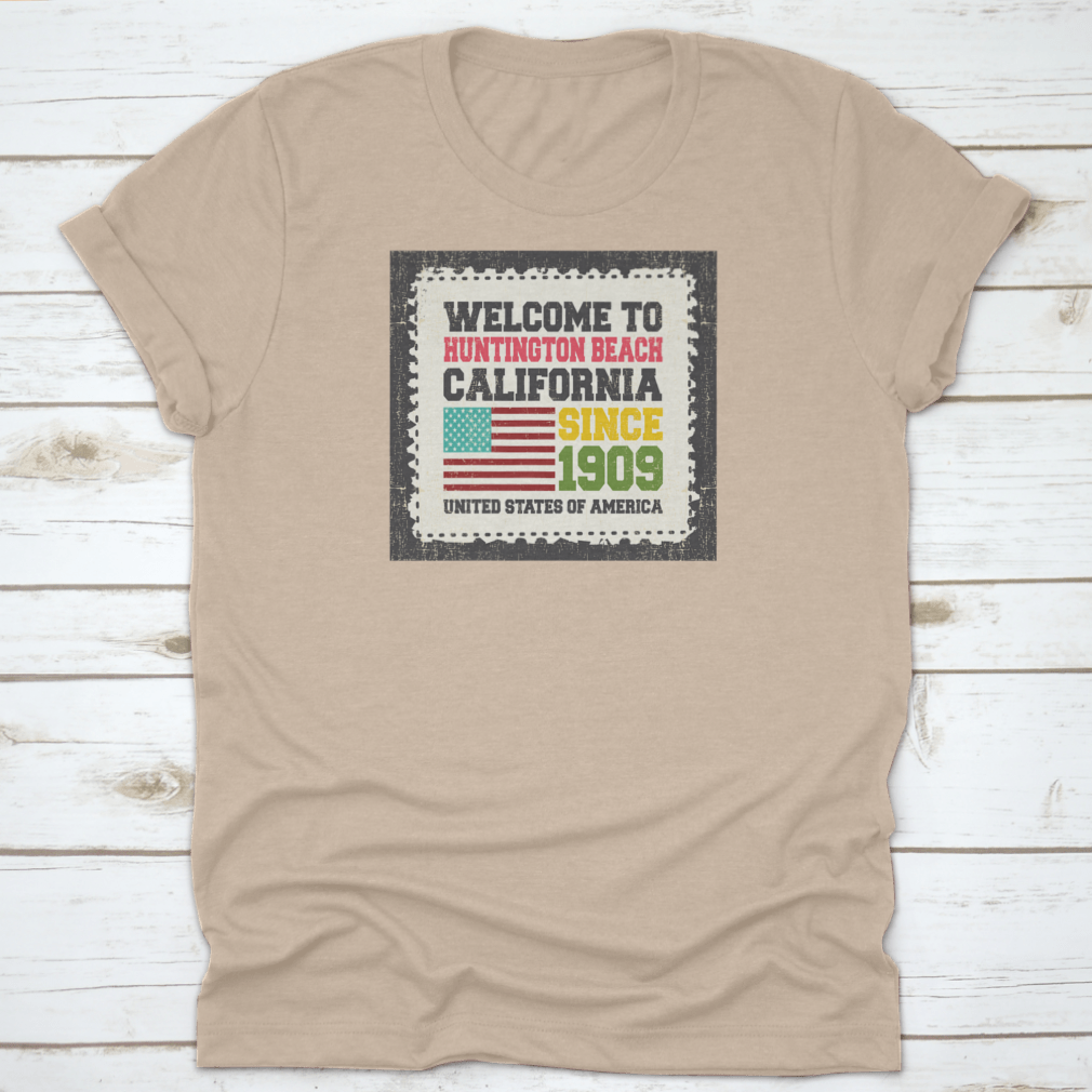 A classic cotton t-shirt featuring the American flag design, representing Huntington Beach, California.