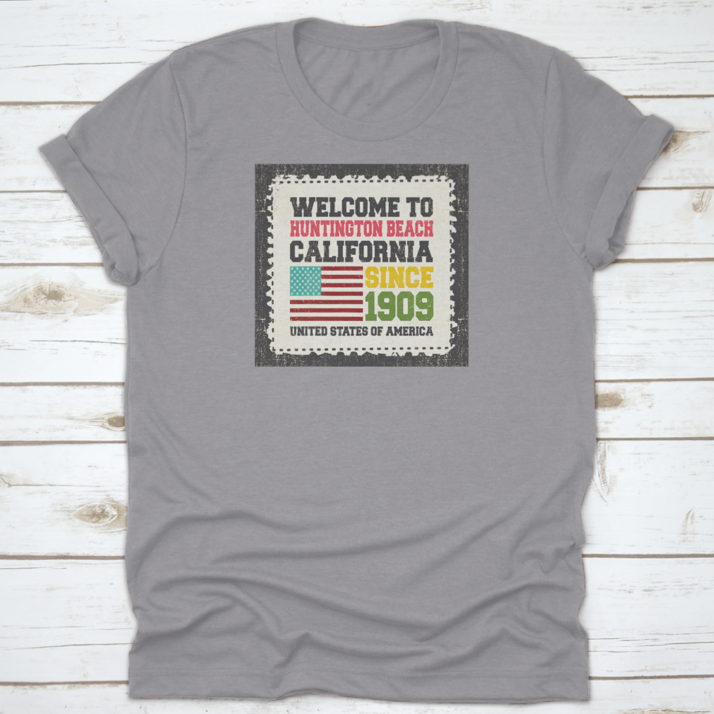 A classic cotton t-shirt featuring the American flag design, representing Huntington Beach, California.
