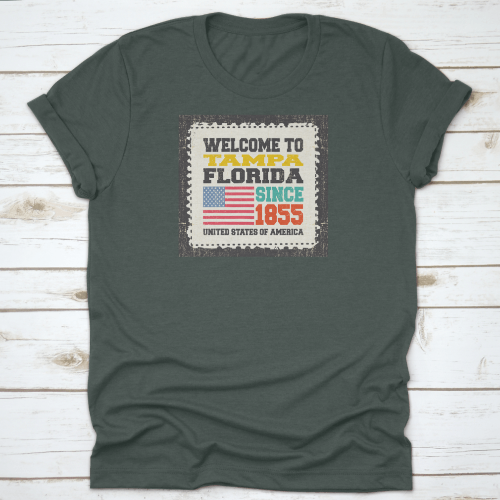 A classic cotton t-shirt featuring the phrase 'Welcome To Tampa, State Florida. Since 1855' with an American flag design.