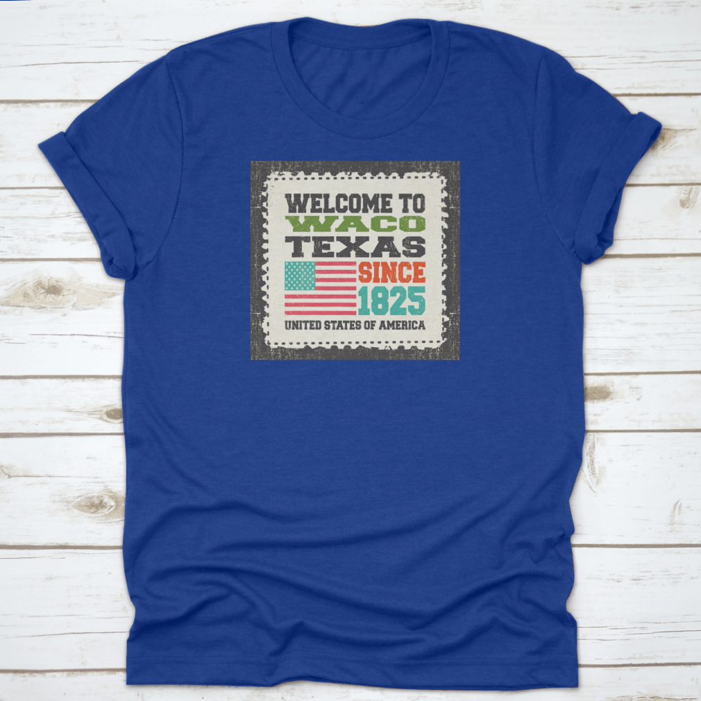 A stylish cotton t-shirt featuring the phrase 'Welcome To Waco State Texas Since 1825' with an American flag design, perfect for travel enthusiasts.