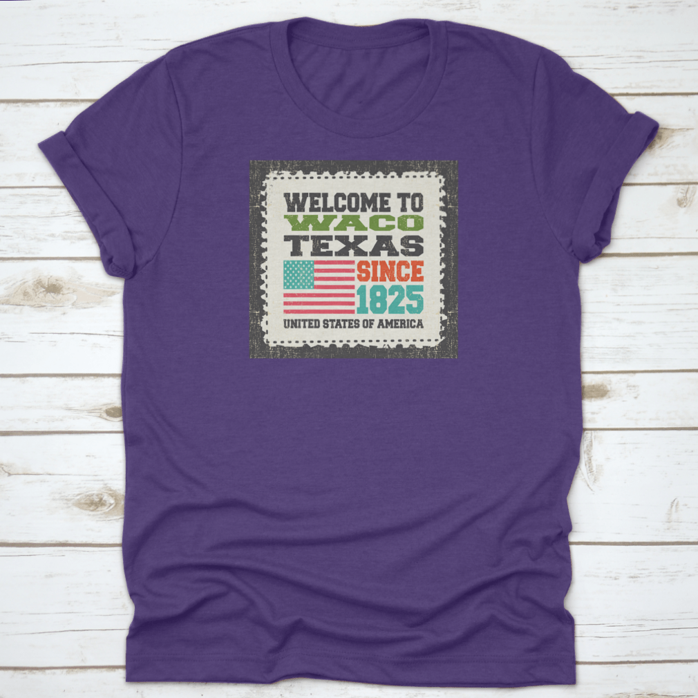 A stylish cotton t-shirt featuring the phrase 'Welcome To Waco State Texas Since 1825' with an American flag design, perfect for travel enthusiasts.