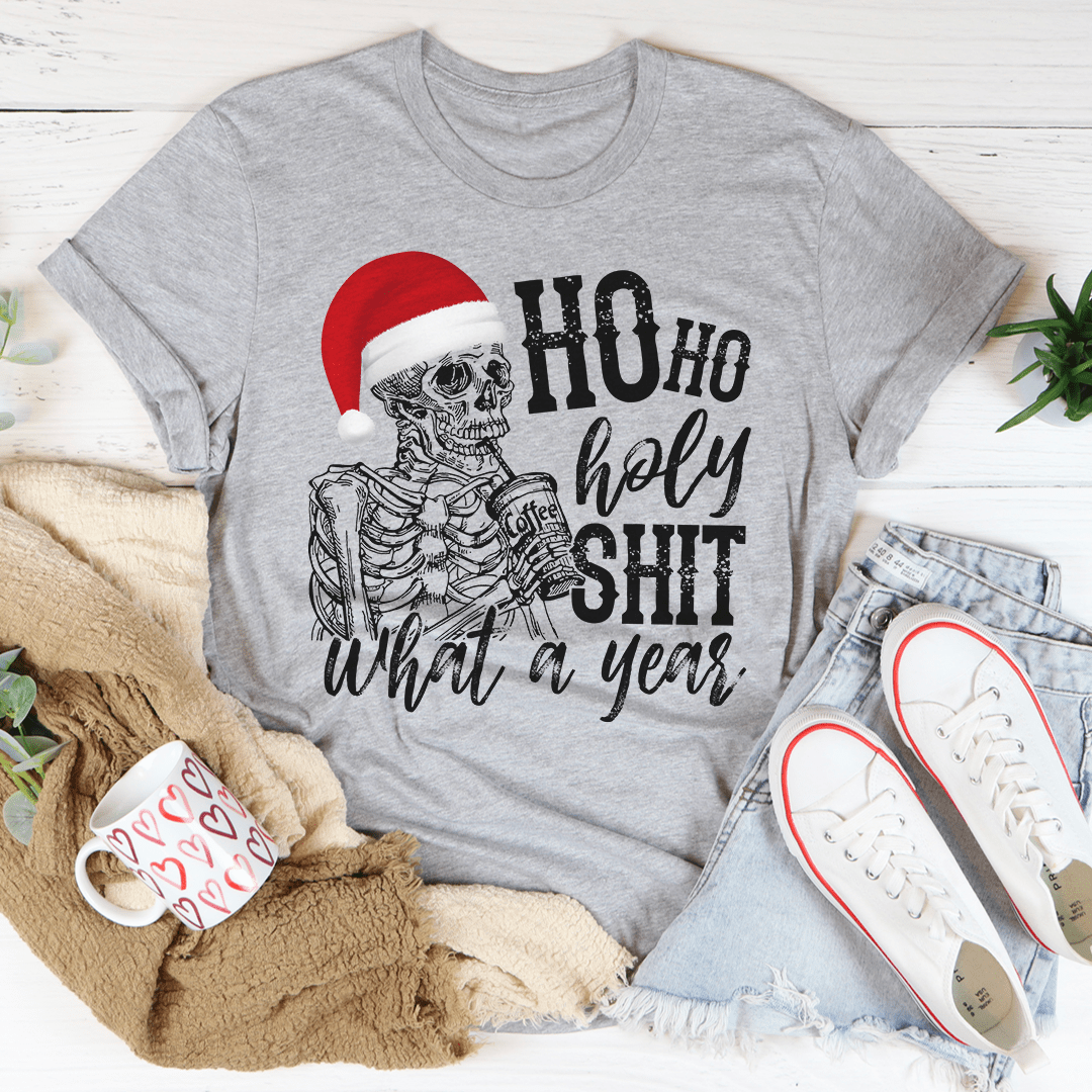 What A Year Christmas Tee featuring a festive design, made from 100% soft cotton, perfect for holiday celebrations.