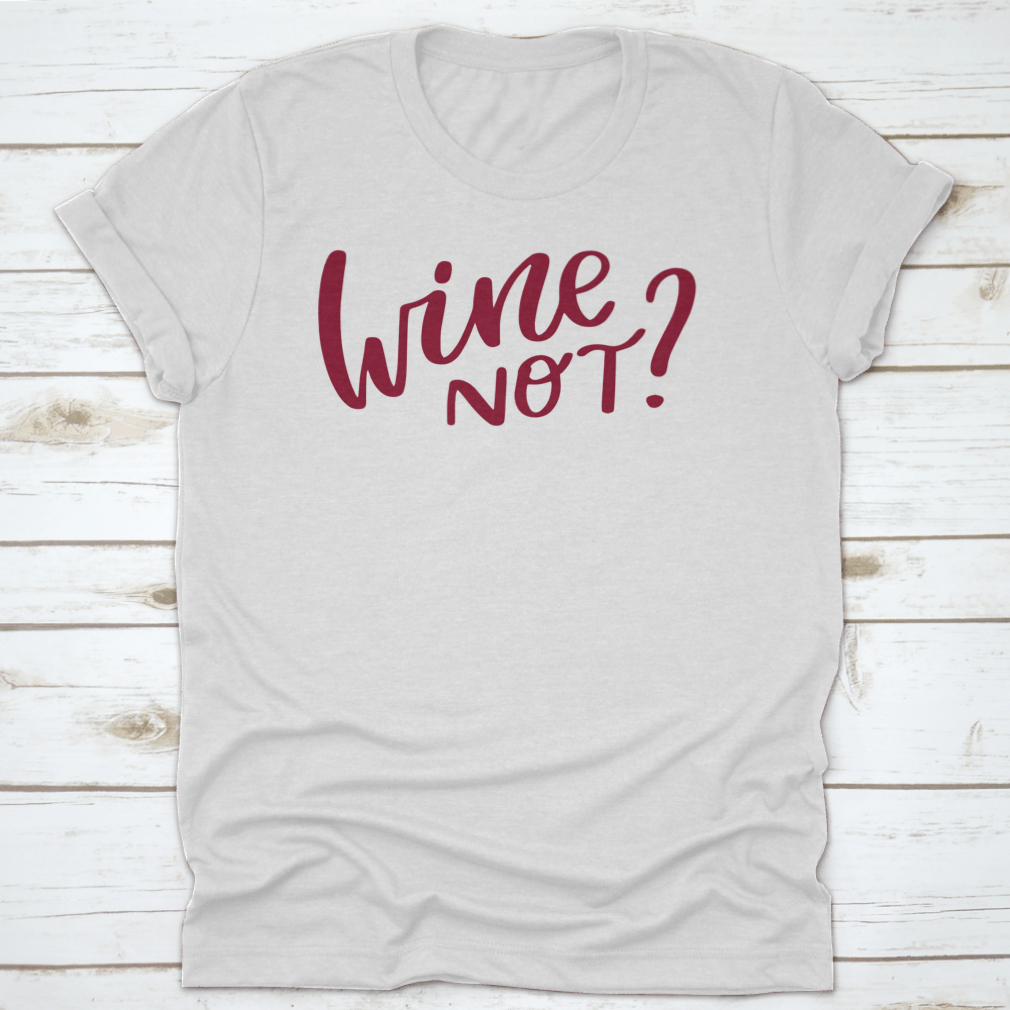 A stylish shirt featuring a positive quote 'Wine Not' in elegant calligraphy, made from soft cotton fabric.
