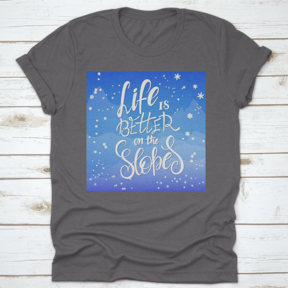 Winter-themed t-shirt featuring snowflakes and mountain flare design, made from soft cotton fabric.