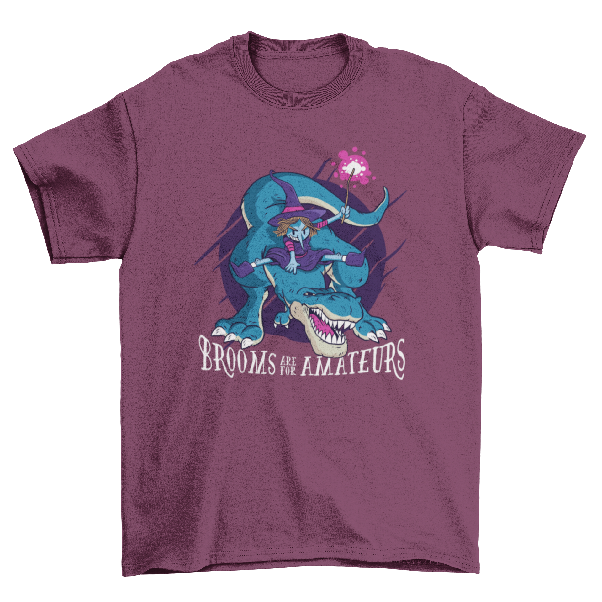 A humorous Halloween T-shirt featuring a witch riding a T-rex with the quote 'BROOMS ARE FOR AMATEURS'.