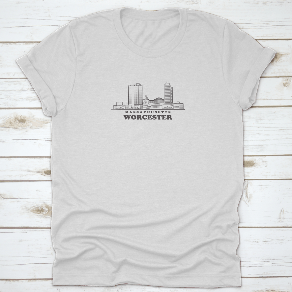 A comfortable cotton T-shirt featuring a drawn sketch of the Worcester skyline in Massachusetts, showcasing its iconic buildings.