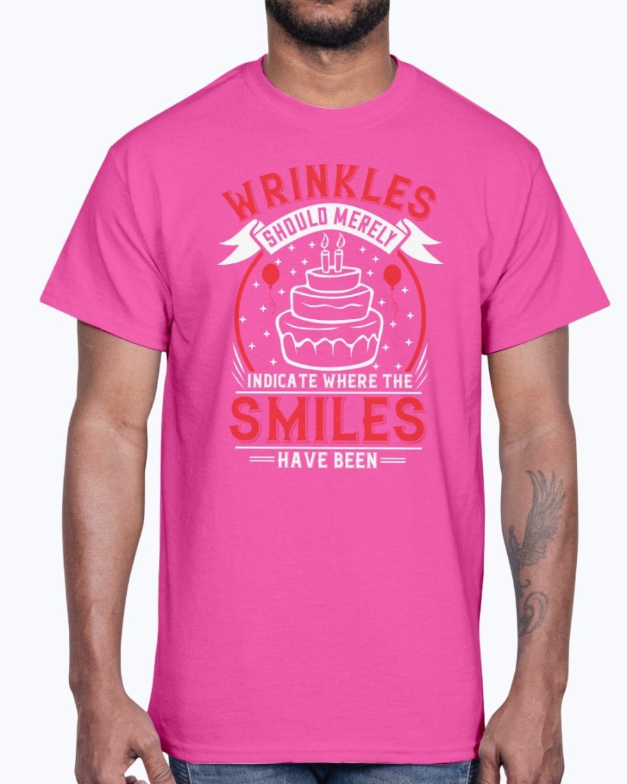 A stylish cotton tee featuring the phrase 'Wrinkles should merely indicate where the smiles have been' in a cheerful font, perfect for birthday celebrations.