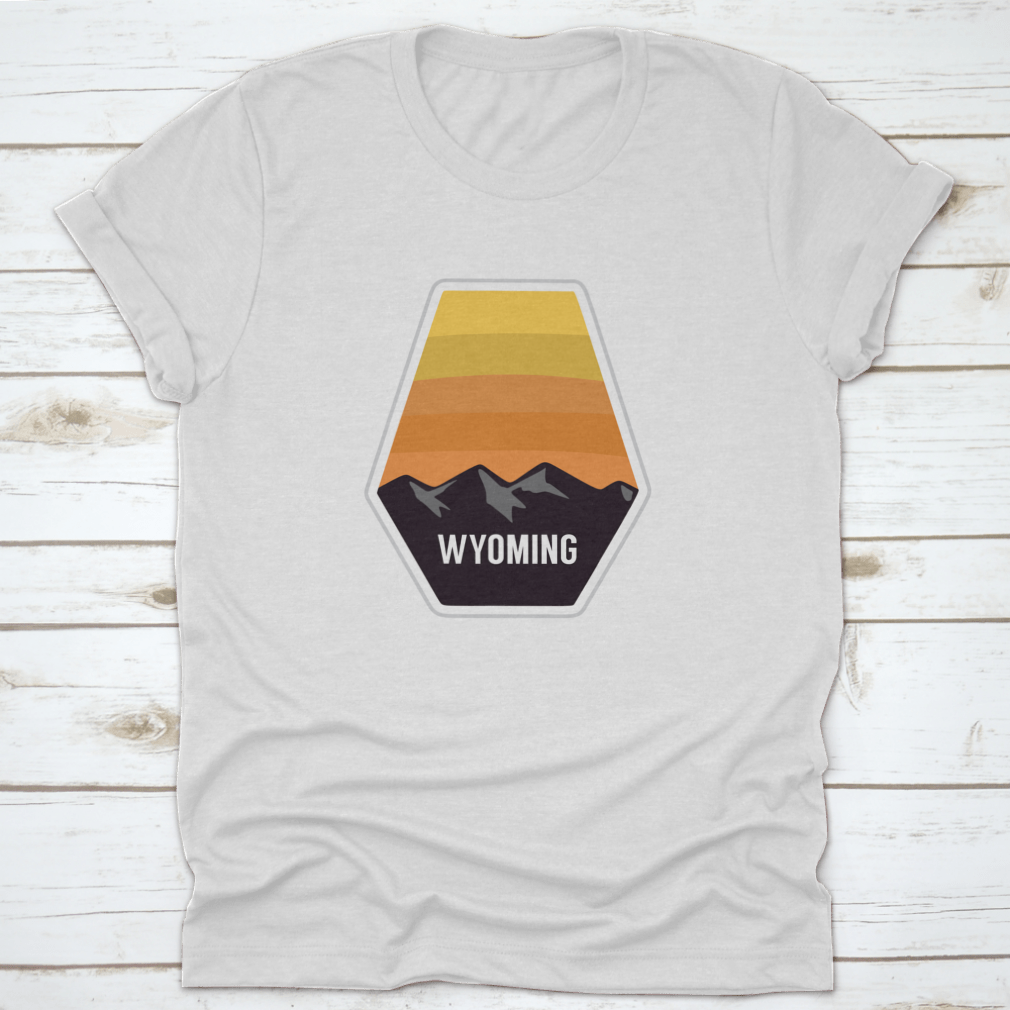 Black travel apparel featuring Wyoming mountain silhouettes, showcasing outdoor adventure and nature.