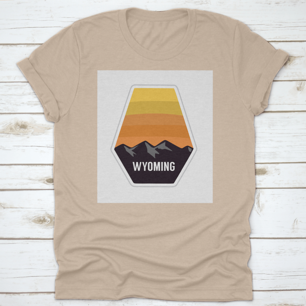 Black travel apparel featuring Wyoming mountain silhouettes, showcasing outdoor adventure and nature.