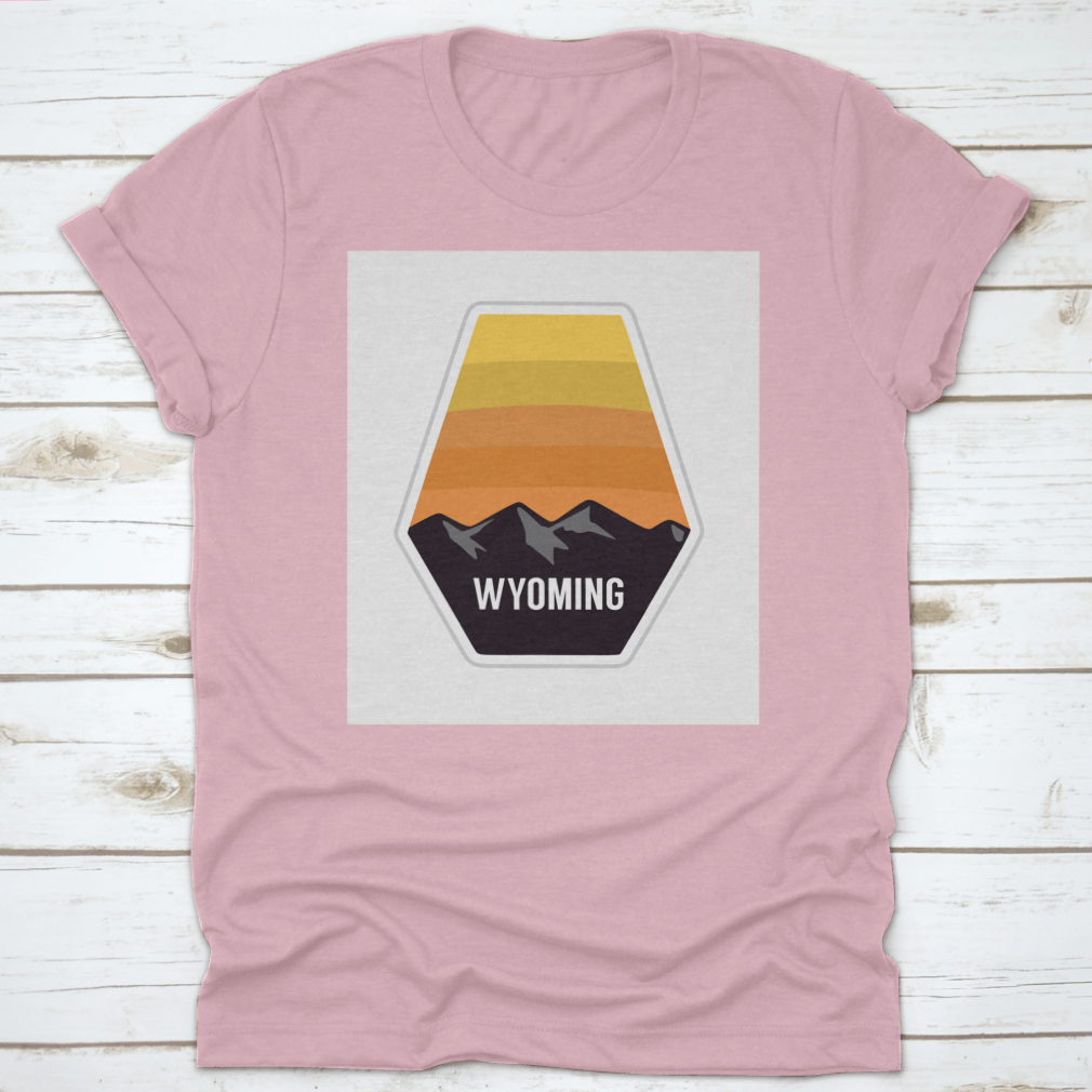 Black travel apparel featuring Wyoming mountain silhouettes, showcasing outdoor adventure and nature.