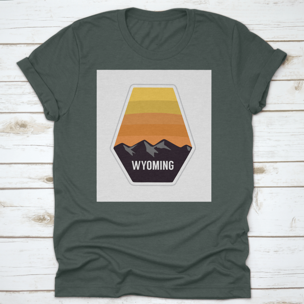 Black travel apparel featuring Wyoming mountain silhouettes, showcasing outdoor adventure and nature.