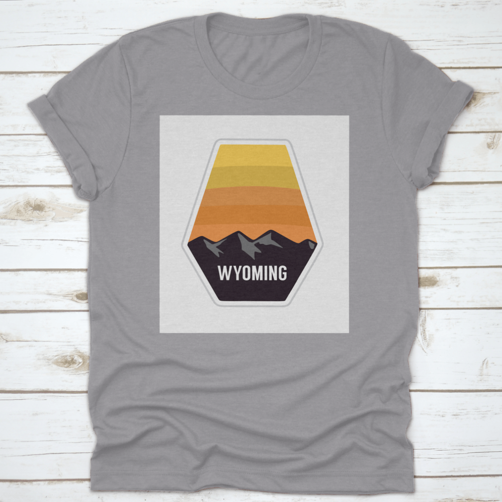 Black travel apparel featuring Wyoming mountain silhouettes, showcasing outdoor adventure and nature.