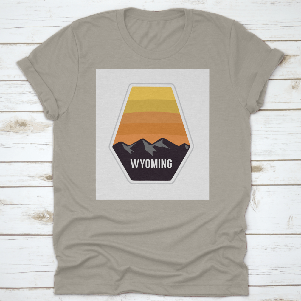 Black travel apparel featuring Wyoming mountain silhouettes, showcasing outdoor adventure and nature.
