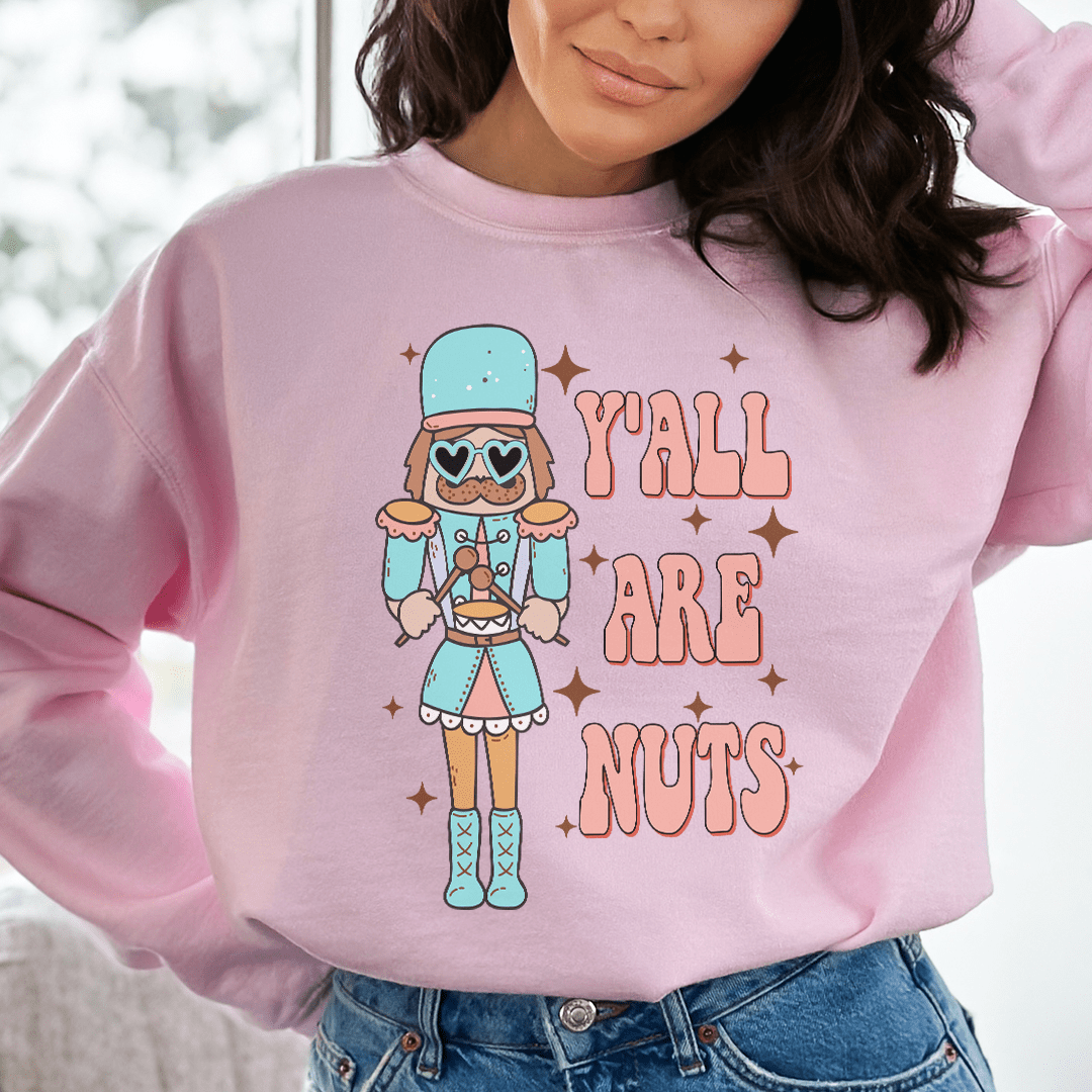 Y'all Are Nuts sweats featuring unique designs by top artists, showcasing a cozy fleece lining and adjustable cuffs.