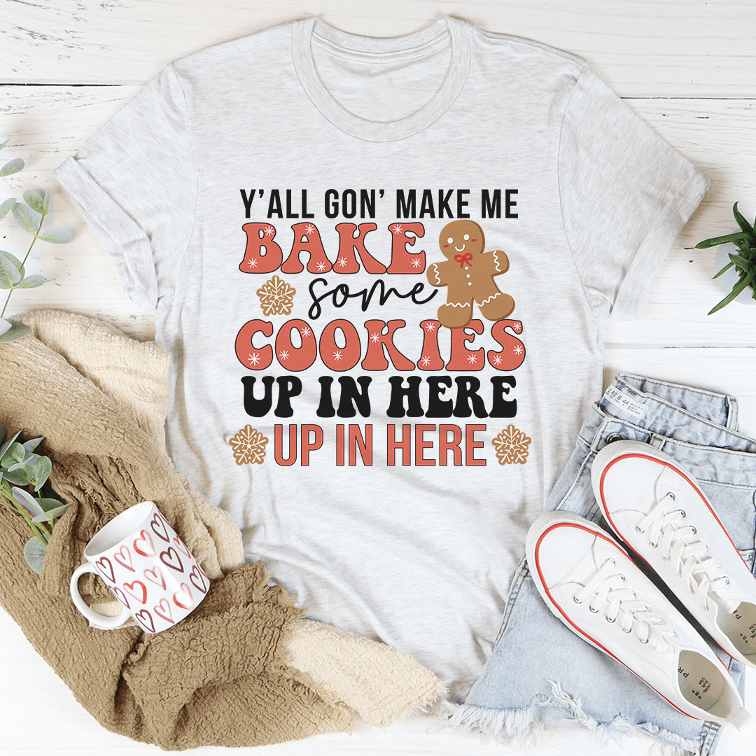Festive Y'All Gon' Make Me Bake Some Cookies Tee made from 100% soft cotton, featuring vibrant holiday-themed graphics.