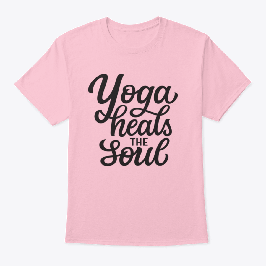 A hand-drawn quote 'Yoga Heals The Soul' printed on a white cotton t-shirt, showcasing a stylish and inspirational design.
