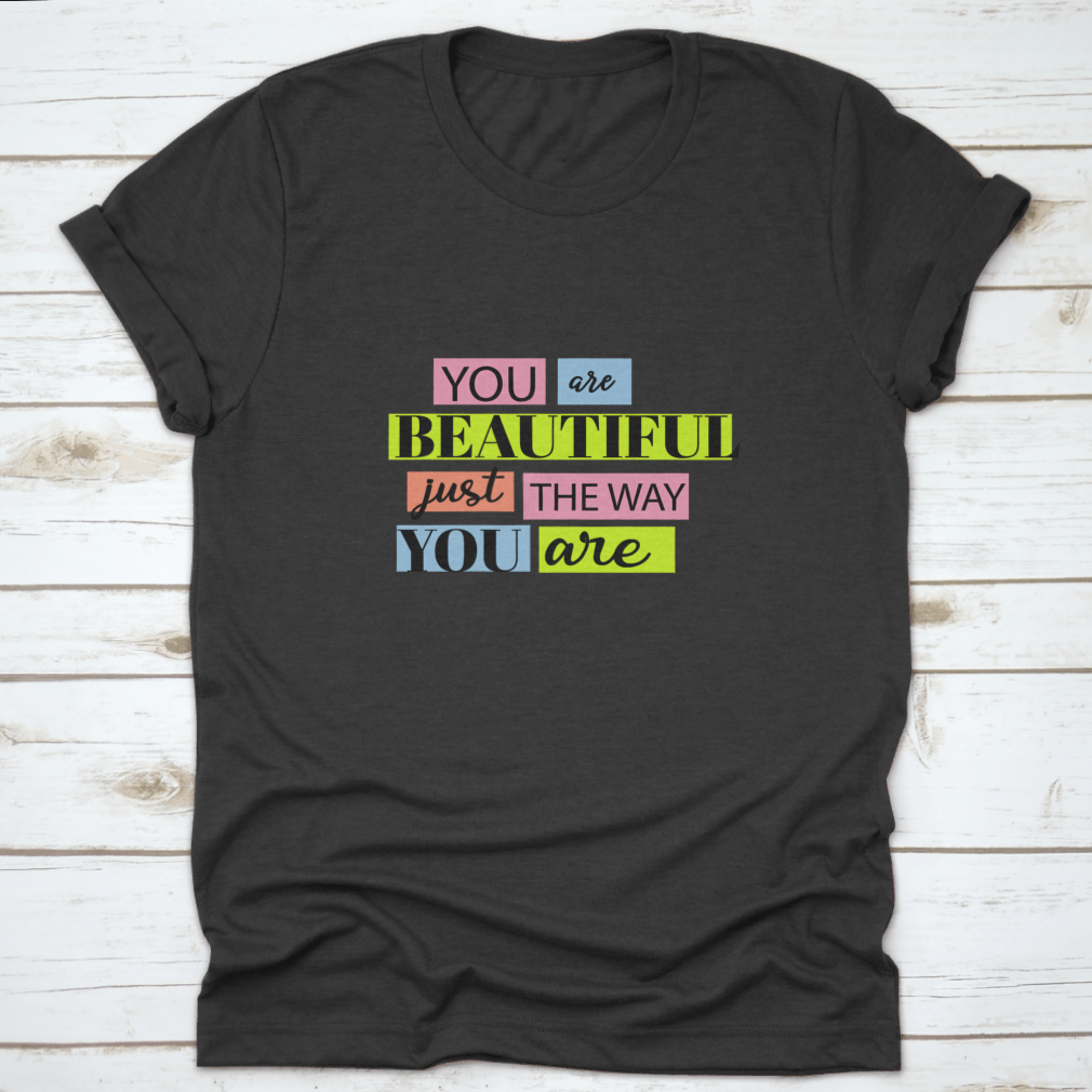 A stylish T-shirt featuring the motivational quote 'You Are Beautiful' in an inspiring design, made from soft cotton fabric.
