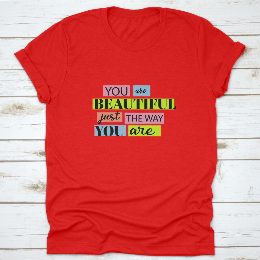 A stylish T-shirt featuring the motivational quote 'You Are Beautiful' in an inspiring design, made from soft cotton fabric.