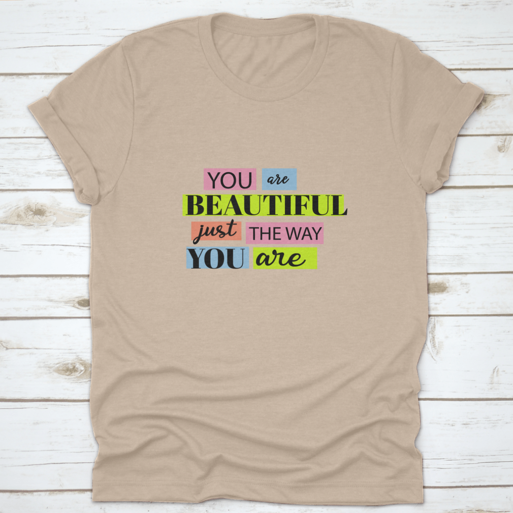A stylish T-shirt featuring the motivational quote 'You Are Beautiful' in an inspiring design, made from soft cotton fabric.