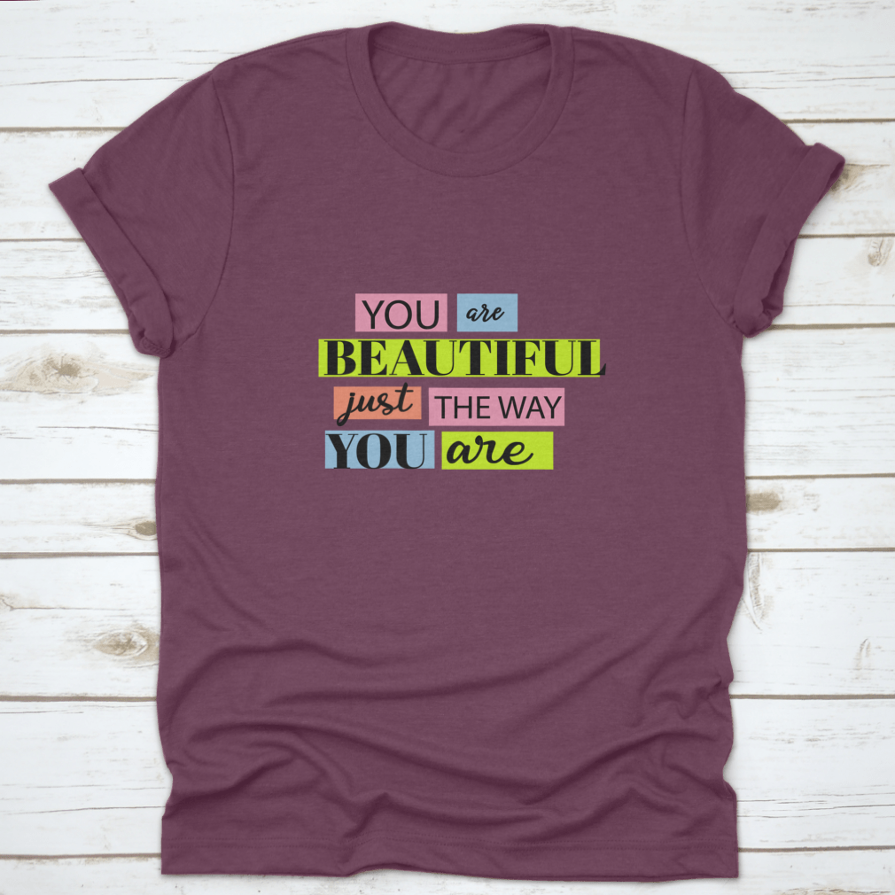 A stylish T-shirt featuring the motivational quote 'You Are Beautiful' in an inspiring design, made from soft cotton fabric.
