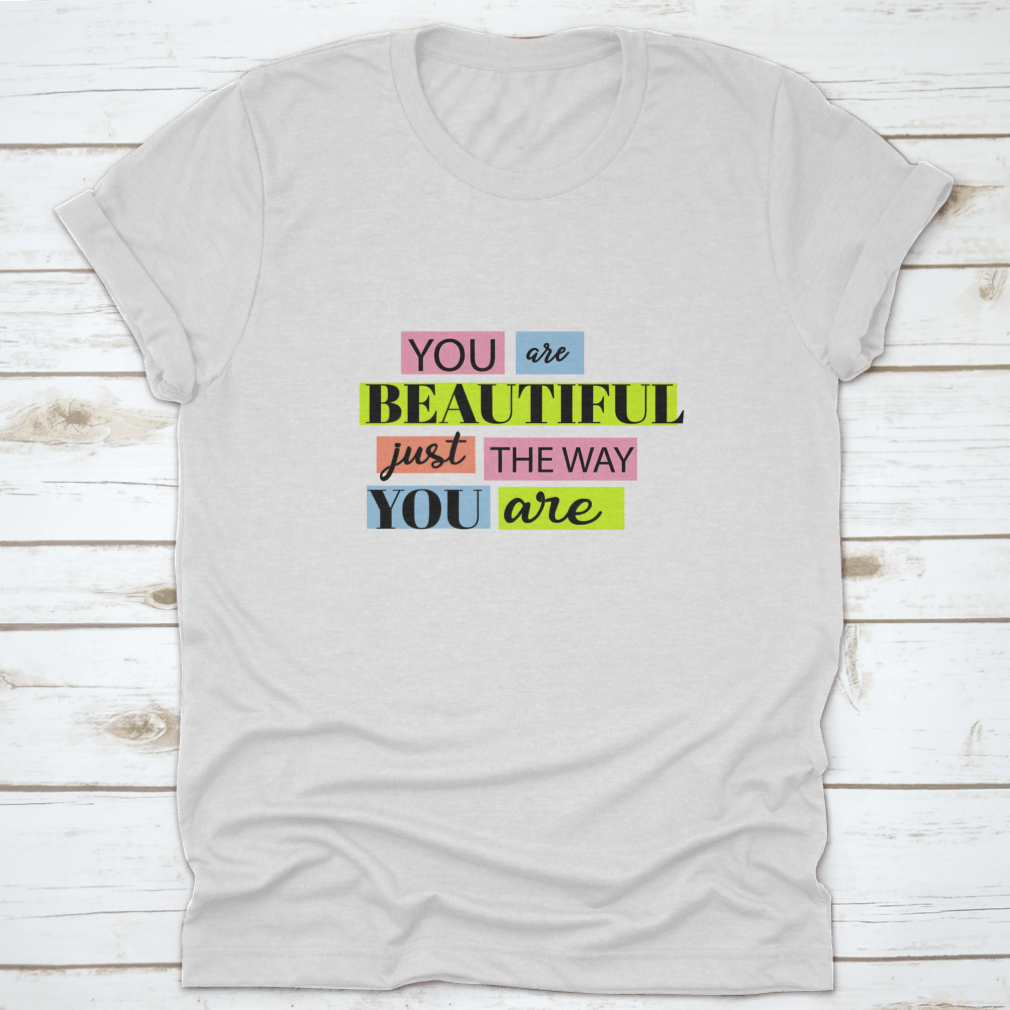 A stylish T-shirt featuring the motivational quote 'You Are Beautiful' in an inspiring design, made from soft cotton fabric.