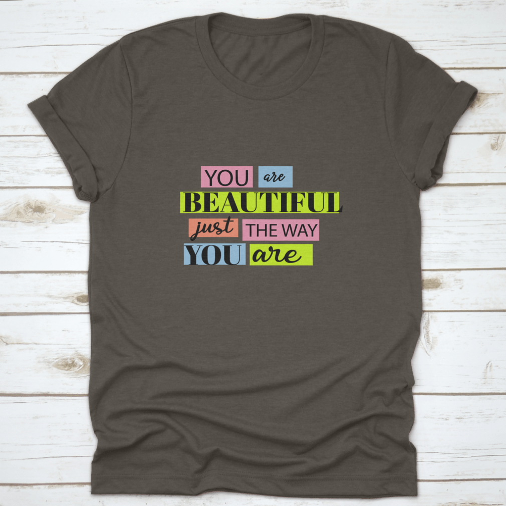 A stylish T-shirt featuring the motivational quote 'You Are Beautiful' in an inspiring design, made from soft cotton fabric.