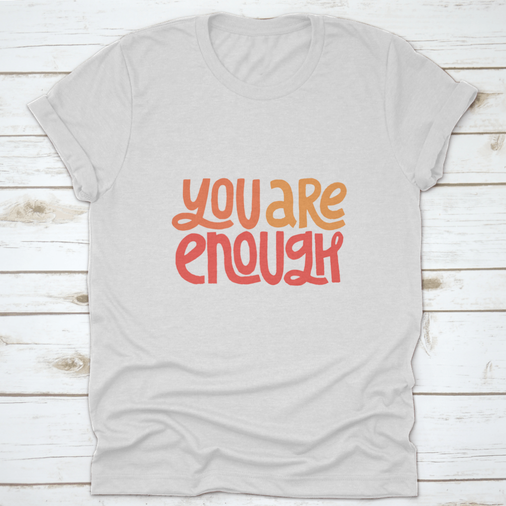 You Are Enough Inspirational Design T-Shirt displayed on a mannequin, showcasing its classic fit and motivational message.
