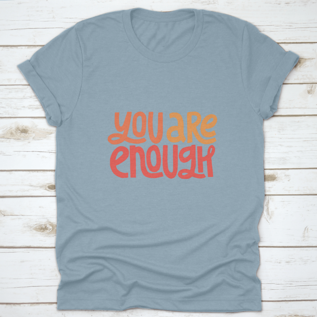 You Are Enough Inspirational Design T-Shirt displayed on a mannequin, showcasing its classic fit and motivational message.