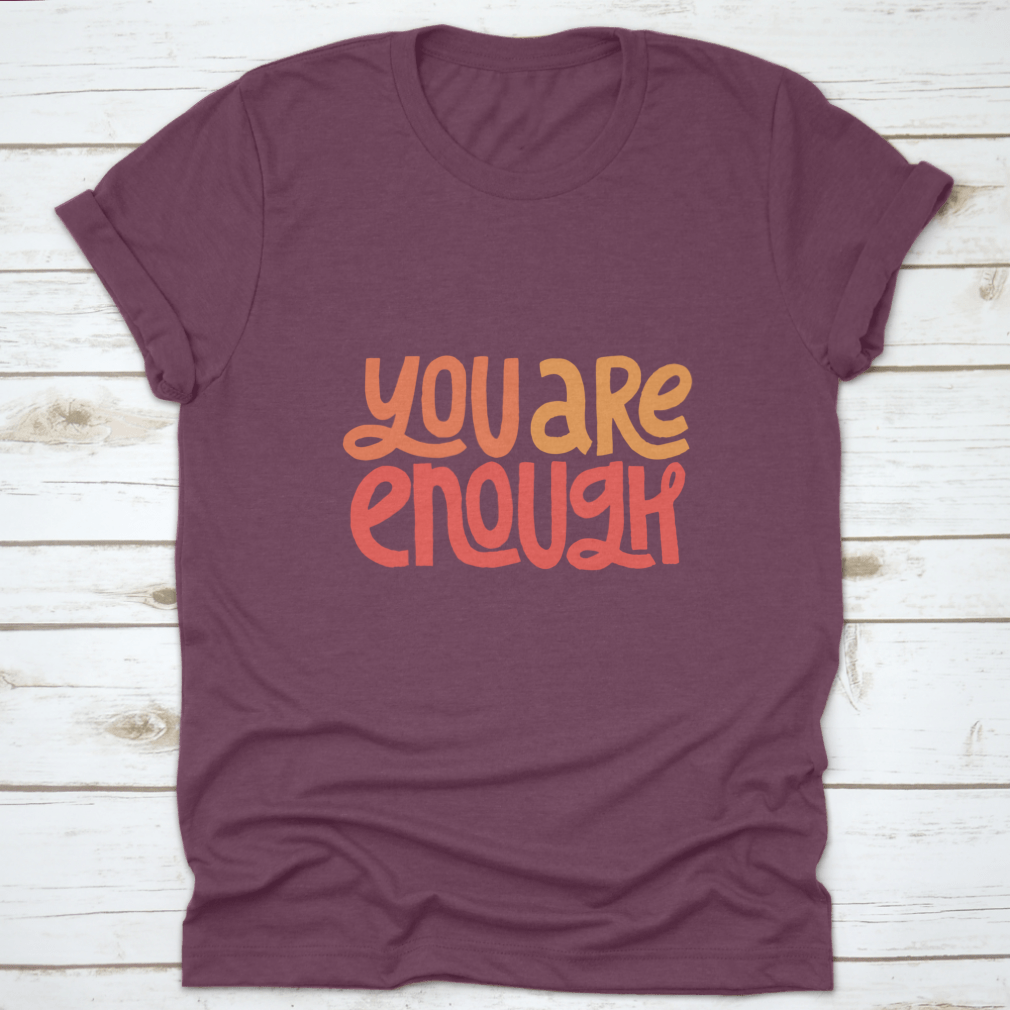 You Are Enough Inspirational Design T-Shirt displayed on a mannequin, showcasing its classic fit and motivational message.