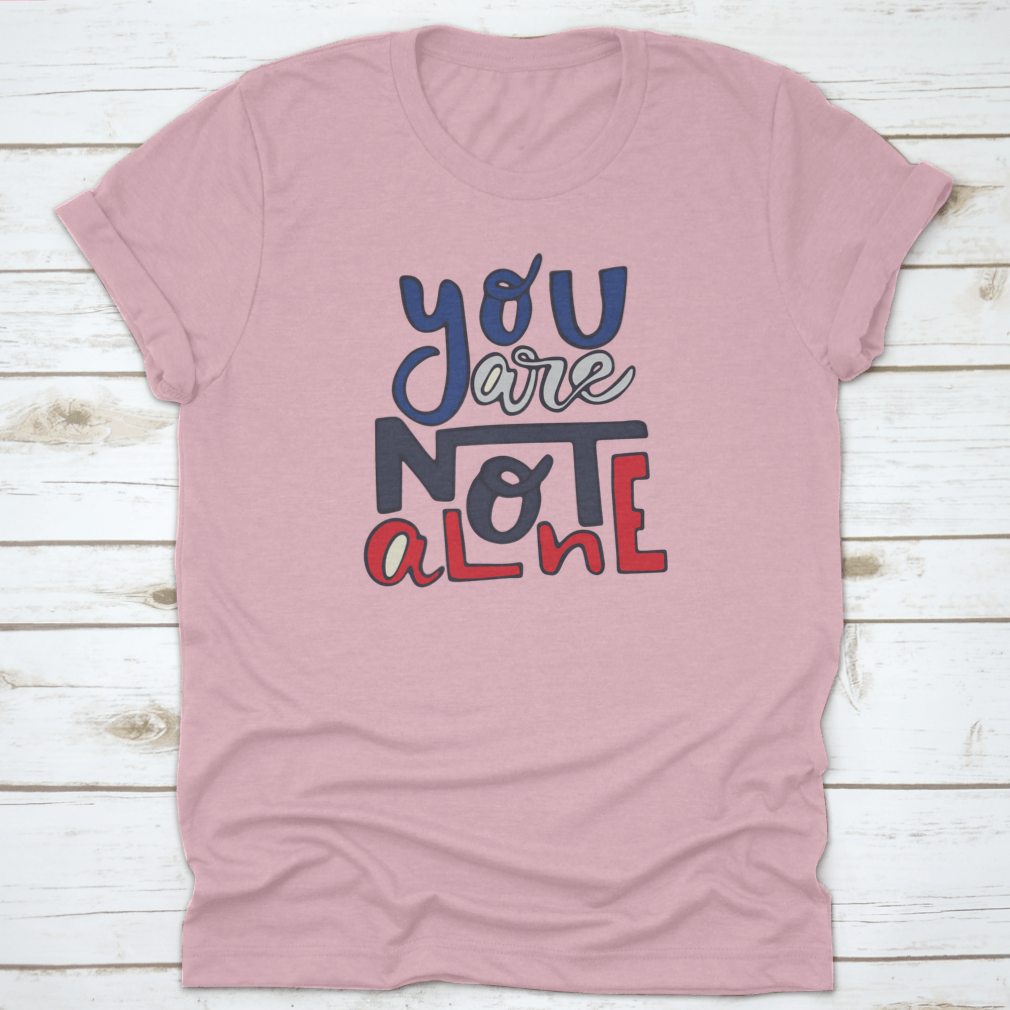 A soft cotton shirt featuring the inspirational quote 'You Are Not Alone' in a stylish design, perfect for casual wear.